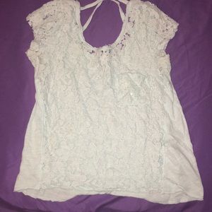 A very light blue shirt with little sparkles